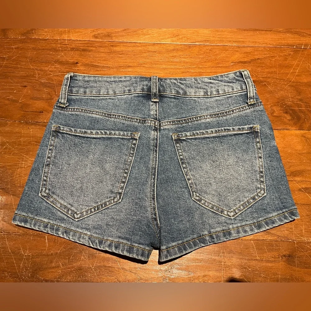 High-Rise Distressed Denim Shorts